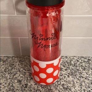 Minnie Mouse water bottle w/ straw.Few marks on her face see in pictures.